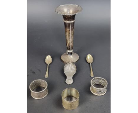 Three silver napkin rings; together with two silver teaspoons; and a silver caddy spoon, 119g. (6)