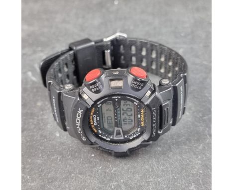 A Casio 'G-Shock Mudman' quartz wristwatch, 45mm, having red pushers, Ref. 3031 G-9000, on original strap.