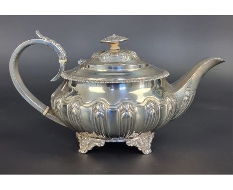A George IV silver teapot,&nbsp;maker's mark rubbed, London 1824, with ivory insulators, 15.5cm high, gross weight 705g. DEFR