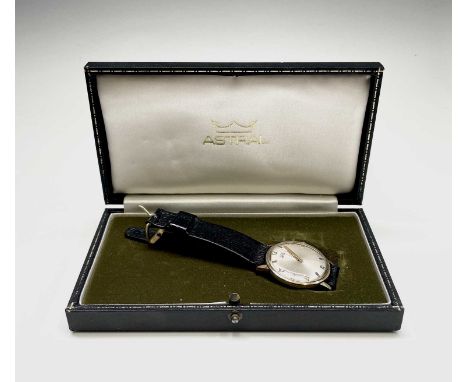 A Holmans presentation gold watch by Astral with sweep seconds and Arabic numerals The back inscribed to J Carlyon for 30 yea