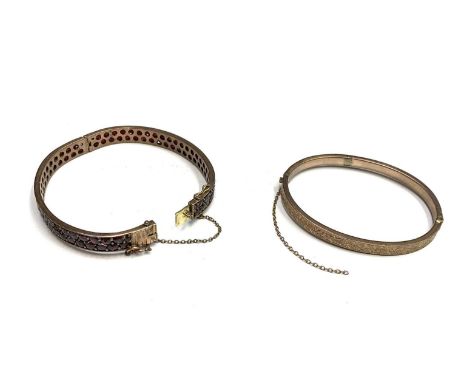A Victorian low purity gold bangle pave set with garnets 20gm and one other gold bangle 7gmCondition report: Neither is marke
