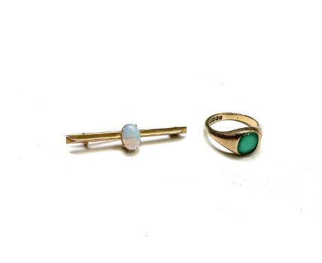 A 9ct gold and chrysoprase signet ring Birmingham 1980 3.3gm Size J almost K and a 9ct gold bar brooch set an opal 1.4gm