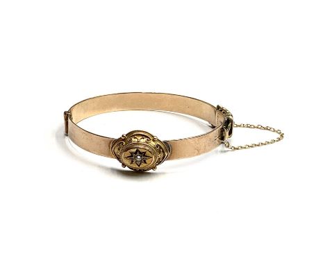 A gold hinged bangle 14.6gmCondition report: This incorporates various pieces Tests suggest that the plain band is 9ct and th