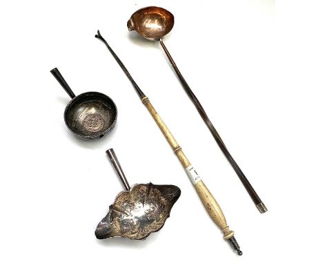 A turned ivory punch ladle handle, lacking bowl, together with two silver punch ladle bowls, one coin set with a 1745 shillin