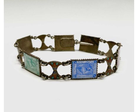 An Egyptian silver bracelet with six enamelled postage stamp links separated by enamel palmettes 18.5cm long 12.78mm wide 17.