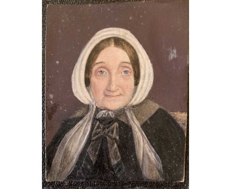 Finely painted portrait miniature. Portrait of a mature Victorian ladyWatercolour on ivory in glazed, ebonised rectangular fr