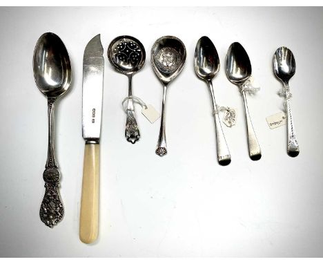 An Elkington Manchester Dog Show silver spoon, a smaller Darlington Dog Show spoon, four other silver spoons and a silver bla