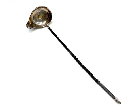 A George III punch ladle set with a 1808 gold third of a guinea, with spiral whale bone handle.
