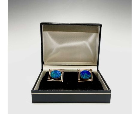 A pair of 10ct gold opal set cuff-links 10.8gmCondition report: These are in very good condition apart from an indistinct fis