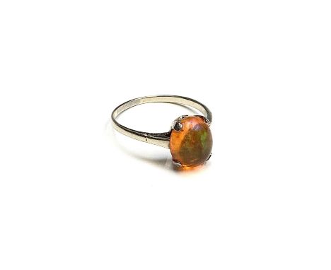 A platinum ring set with a fire opal of 1.34cts Ring size MCondition report: Only very minor scratching to the stone