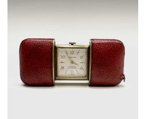 A Hermes 15 jewel purse timepiece in gold plated with sliding red leather case 53.2x35.6mm when closed and 79mm long when ope