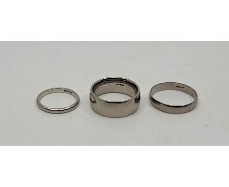 A palladium .500 band, (9.9g), size approx. UK R, together with another palladium .500 band, (2.1g) size UK S1/2, and a plati
