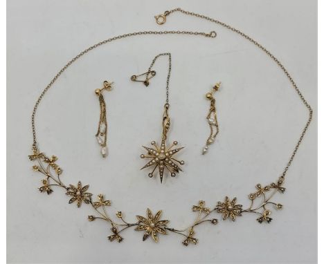 An early 20th century 15ct. yellow gold and seed pearl set star pendant/brooch, diameter 30mm, (gross weight 4.3g), together 