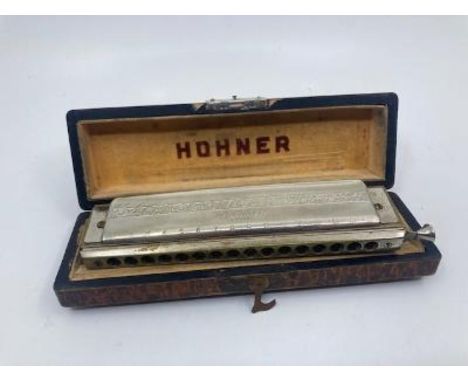 A Jumbo cased Horner Harmonica