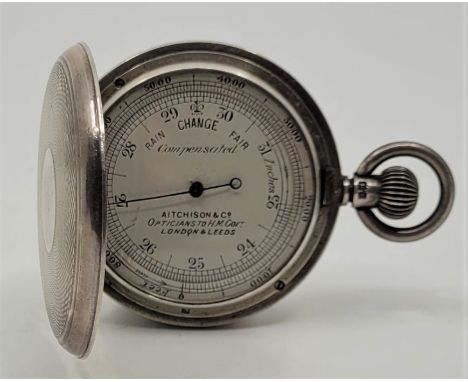 An early 20th century Aitchison &amp; Co. Ltd. compensated silver pocket barometer, having signed silver dial with outer alto