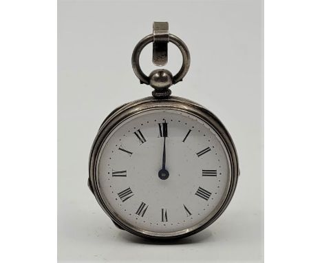 An early 20th century engine turned silver pedometer, having white enamel Roman numeral dial, 44mm wide silver case stamped "