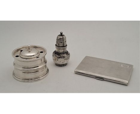 An Edwardian silver circular inkwell, of capstan form with five holes for pens, London 1909, diameter 8.8cm, together with en