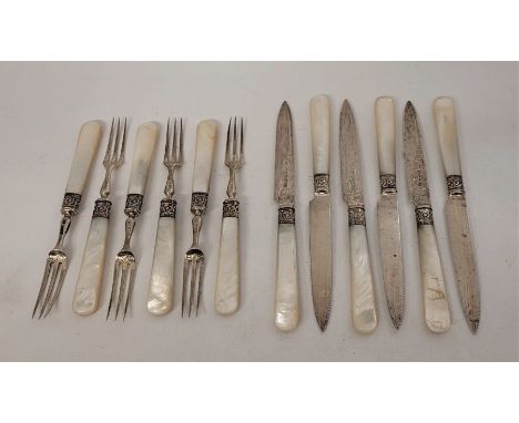 A set of silver and mother of pearl handled fruit knives and forks, by George Howson, Sheffield 1922-1924, some handles as fo