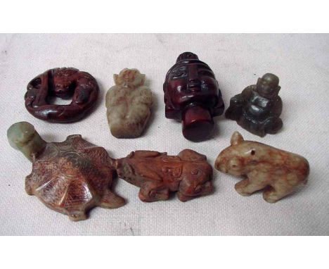 A collection of seven Chinese jade/hardstone Funerary figures including Buddha bust, seated Buddha, tortoise, hippo and other