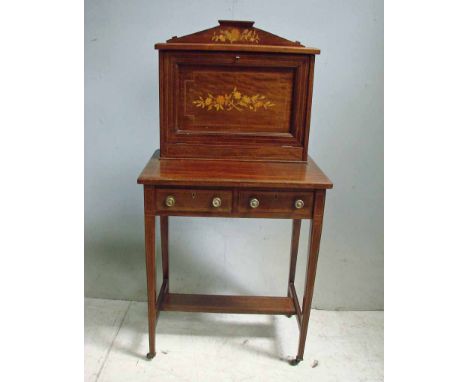 An early 20th century Sheraton revival mahogany ladies writing bureau, angled pediment with floral inlay, inlaid moulded edge