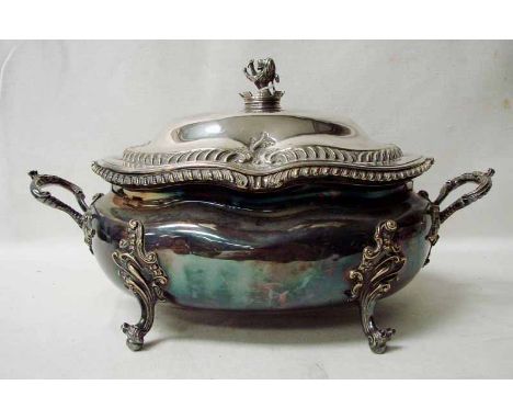 A good quality early 20th century silver plated soup tureen of typical oval form, the lid with a lion within a circular caste