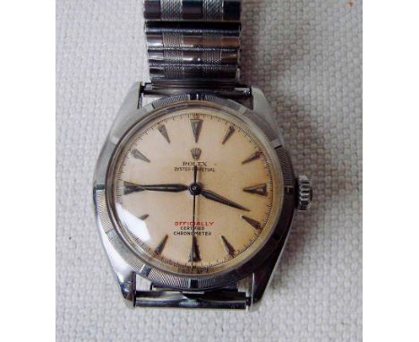 A Rolex Oyster Perpetual Automatic wrist watch, circa 1950, stainless steel, champagne dial with dagger batons centre seconds
