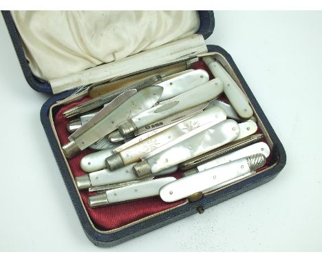 Twenty hallmarked silver and mother of pearl fruit knives, and twenty-eight various pocket knives.