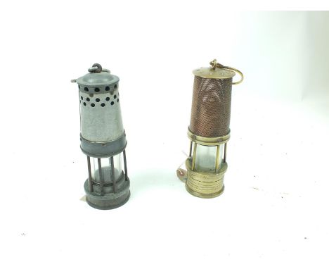 A Davis Boss miner's lamp, together with another by Teale & Co., Swinton, Lancashire. (2)