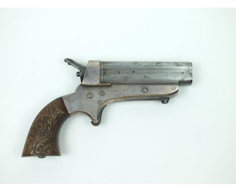 A Tipping & Lawden obsolete calibre .32 rimfire four-shot Sharp's patent pistol. Rotating hammer nose retaining clip lacking.