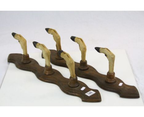 Pair of Oak mounted Taxidermy Deer foot Coat / Stick,/ Gun racks, each approx 63cm long with three hooks