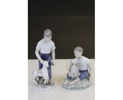 Two Bing &amp; Grondahl ceramic models, Boy &amp; Girl with Lamb and numbered 2331 ME &amp; 2336N, tallest stands approx 19cm