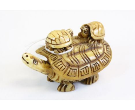Bone figure / netsuke of a turtle with two turtles on shell