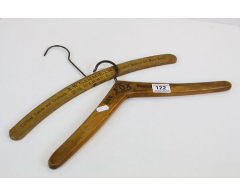 Two Vintage Wooden Advertising Coat Hangers marked ' A W Gamage Ltd ' and ' Fox '