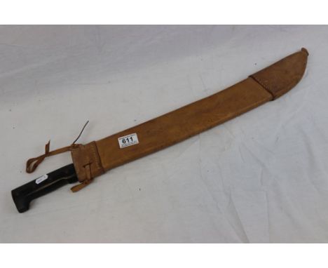 A Vintage Machete In Leather Sheath.