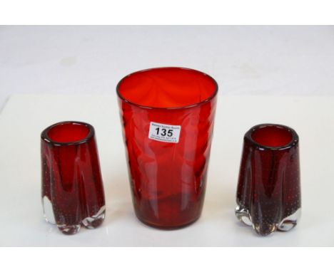 Three vintage red Art glass Vases to include a pair of Whitefriars, tallest stands approx 19.5cm