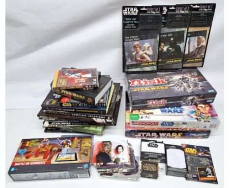 Assortment of Star Wars books, board games (Risk, Monopoly, Chess), Postcards, read along cassettes in mixed lot of ephemera.