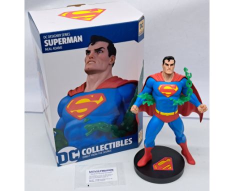 DC Collectibles Superman (Neal Adams) Limited Edition 12 inch statue 1056/5000. Condition Good Plus to ExcellentSmall chip on