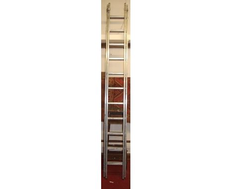 An aluminium twin section adjustable ladder