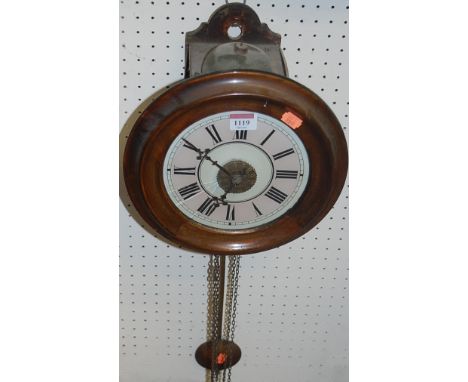 A Victorian walnut postman's alarm clock, having weight driven movement, with pendulum