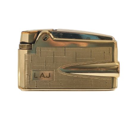 A Ronson lighter with 9ct gold sheathwith original box featuring Ronsons Royal appointment to supply H.R.H the duke of Edinbu