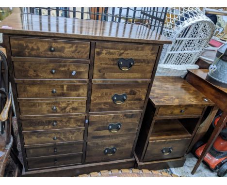 A Laura Ashley chest of drawers and matching bedside chest, the chest of drawers with eight short drawers with four deeper dr