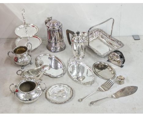 A late 19th century silver plated tankard along with other silver plated items to include a pierced and embossed basket, a tw