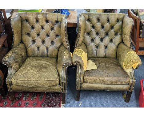 A pair of mid 20th century green leather stud and button back upholstered wingback Chesterfield armchairs A/FLocation: 
