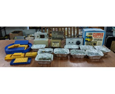 Meccano and other components and accessories to include a Stokys electric motor and spring motor, a H&M Clipper transformer c