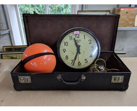 A leather bound case, along with a reproduction electric Smiths clock and an orange circular retro lamp Location: 