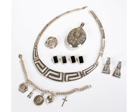 Silver jewellery, to include a necklace and earring set, a Victorian locket, flower brooch, a pair of cufflinks with black en