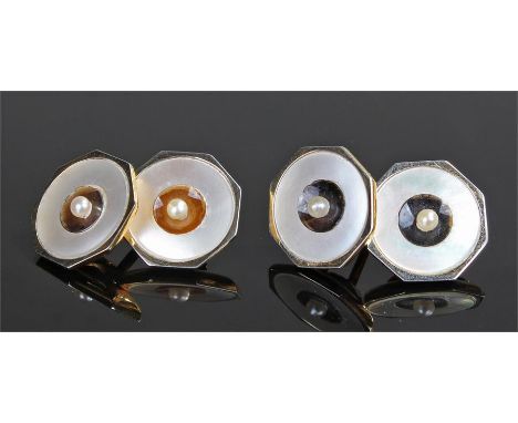 Pair of 18 carat gold and pearl cufflinks, with circular discs centred with pearls
