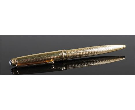 Montblanc Meisterstuck gold plated ball point pen, the engine turned case with twist top
