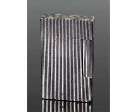 Du Pont lighter, the white metal case with line decoration, numbered F 7 CU51, 6.3cm high