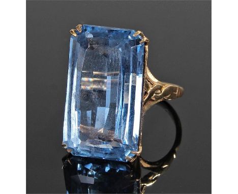 9 carat gold ring, set with a blue stone to fret claws, ring size R